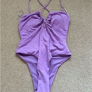 Never been worn purple Zara one piece size small! Amazing material